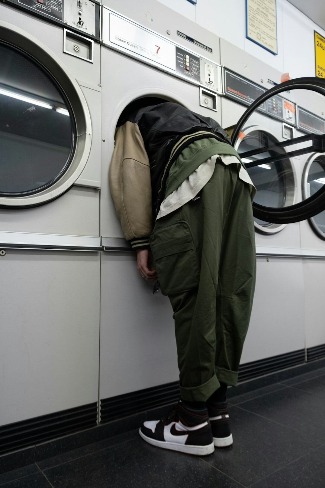 person folding laundry