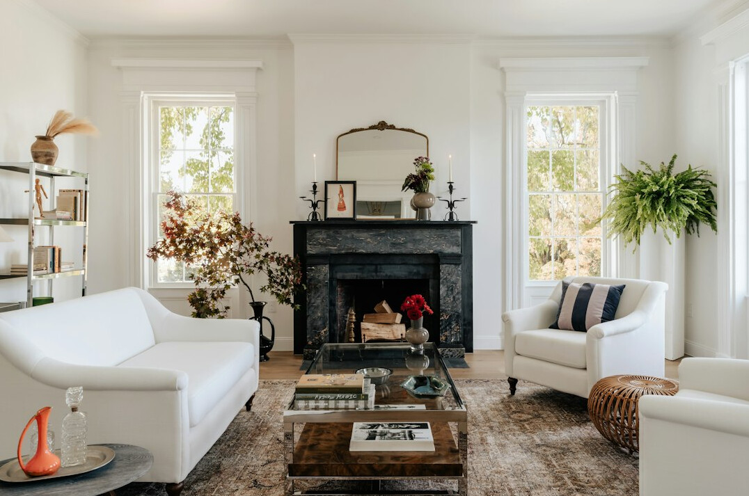 Bright living room with light furniture and a few decor items